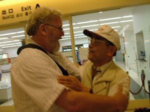 Tom Curtin and Mr. Watanabe greet in Nanae