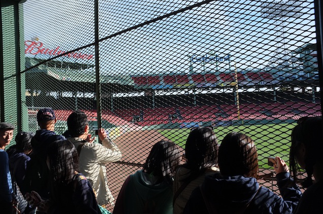 Our group peers into Fenway park from the "Bleacher Bar", located in center field (PHOTO BY KIYOSHI OKADA)