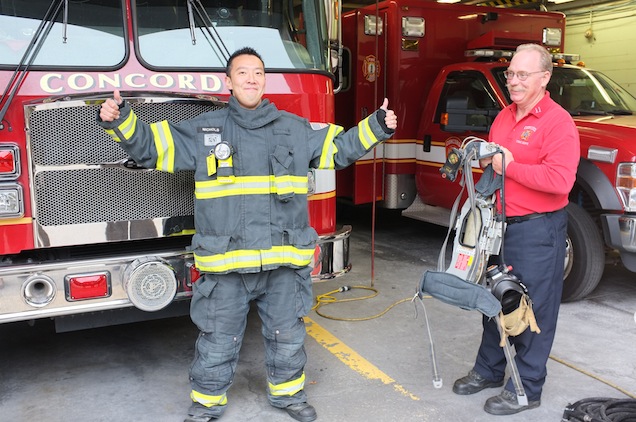 Nanae Volunteer Fire Fighter Naoki Ito gives two thumbs for Concord's equipment. (PHOTO BY KIYOSHI OKADA) 
